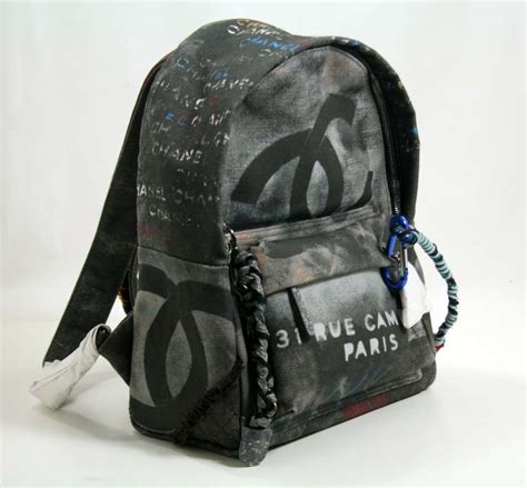 chanel small black graffiti art school backpack